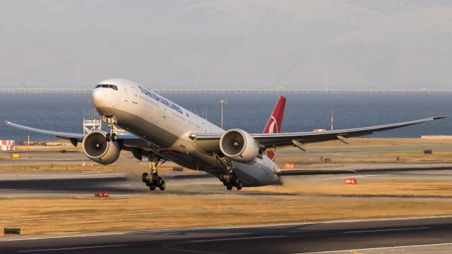 BOEING 777-300ER (TC-JJS) - The 77W pulling the moist SFO air into her massive GE90s.