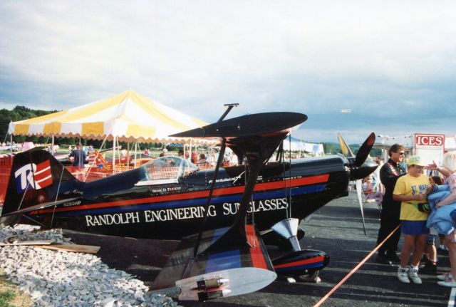 Experimental 100kts-200kts (N260HP) - SUSSEX AIRPORT-SUSSEX, NEW JERSEY, USA-AUGUST 1992: Aerobatic pilot Sean D. Tucker, in the black flight suit greeting some spectators, is shown in front of his plane at the 1992 Sussex Airshow.