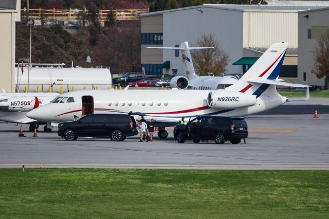 Dassault Falcon 2000 (N926RC) - N926RC is a 2002 Dassault Falcon 2000 seen here with the lady passenger deplaning in front of the Signature FBO at Atlanta's PDK executive airport. I shot this with a Canon 500mm lens. Camera settings were 1/3200 shutter, F4, ISO 200. Please check out my other aviation photography. Votes and positive comments are greatly appreciated as that helps with my photography's popularity. Inquiries about prints or licensing of this photo can be sent to Info@Flews.com