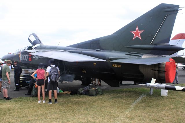 MIKOYAN MiG-27 Bahadur (N23UB) - Ill-fated Mig 23 Flogger at Oshkosh two days before the rear canopy shown departed from the aircraft on a flight.br /br /Glad crew of two ejected safely at Thunder Over Michigan this past weekend and folks on the ground unharmed after it fell out of the sky near Ypsilanti, MI (thank the Lord).br /A rare variable sweep wing aircraft that was still flying.