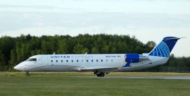 Canadair Regional Jet CRJ-200 (N927SW) - Taxiing to parking is this 2002 United Express Canadair Regional Jet 200LR from the Spring of 2021.