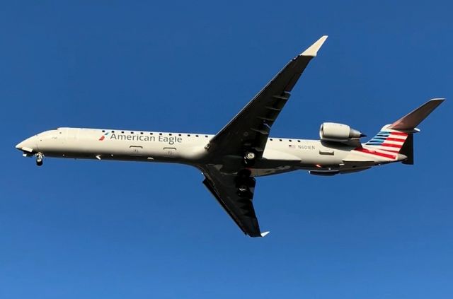 Canadair Regional Jet CRJ-900 (N601EN) - PSA Airlines receives their first new CRJ-900 from Bombardier, complete with the fancy new Atmosphere Interior.