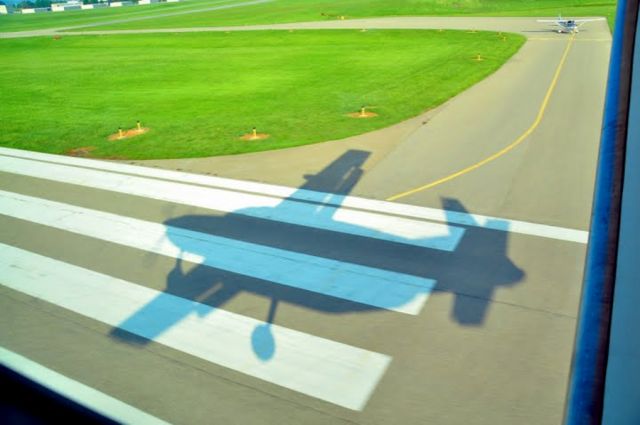 Cessna Caravan (N4120G) - Just before touchdown.