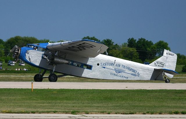 Ford Tri-Motor (NC8407) - EAA Ford Tri-Motor landing after flying demonstration at the EAA Fly In 7-29-2005