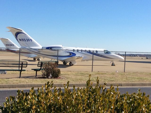 Cessna Citation CJ4 (N953FF) - Nice and clean sitting by the fence at KBWG