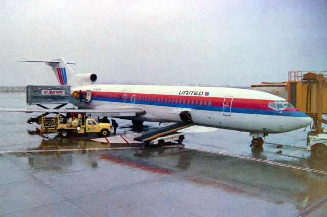 BOEING 727-200 (N7443U) - KOAK - you're not going to believe this but this series of 727 N7443U is all true. I've been going through boxes of negatives from the last 50 years and I rarely took photos at Oakland because it has few photo vantage points so I rarely went there. This day I was up to help work at the WAM Western Aerospace Museum at North Field OAK, and arrived early to I went over to the Terminal to see what I could get through shaded windows and rain. I just happened to get N7443U at the gate - believe me, this is so weird that I have N7443U in 3 different colors, I do not think I have very many others jets in 3 different colors schemes by chance, and find them all on the same day. This photo would have to have been late 1989__?... is all I have. yes, I did play the Lotto tonight and the combination on N7443U is 7-11 which has always been my lucky numbers combo...