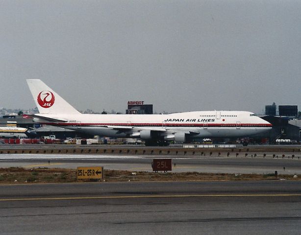 BOEING 747-300 (JA8163) - 747-300 holding short at KLAX for 25R departure to HKG. photo date Sept 1990.