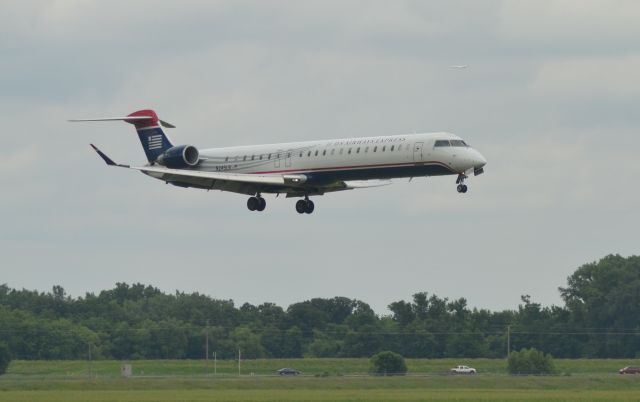 Canadair Regional Jet CRJ-900 (N245LR) - N245LR on the final to Runway 15 in Sioux Falls SD on 6-12-15