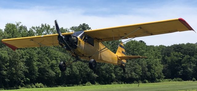 Piper L-21 Super Cub (N8573C) - N8573C picking up a banner.