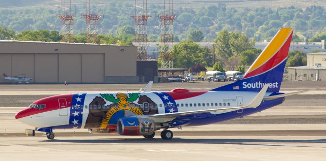 Boeing 737-700 (N280WN) - My other gallery post for today is my first capture of SWAs newest "One" ... "Missouri One" (N280WN) ... as it taxies to the Southwest deck after landing at Reno yesterday morning.  I missed catching it on either of its two previous visits here, but yesterday I was where I needed to be at the right time.  