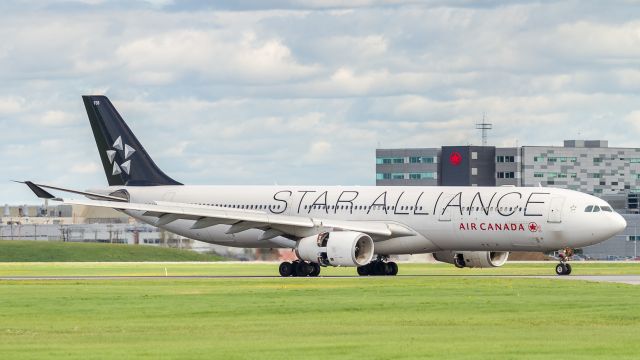 Airbus A330-300 (C-GHLM) - ACA835 arrives from Geneva and slows on runway 24R at Montreal