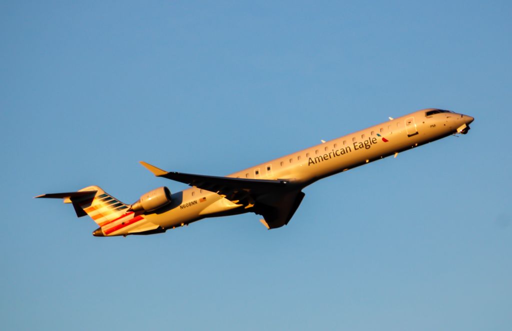 Canadair Regional Jet CRJ-900 (N608NN) - A beautiful sunrise as a empty American CRJ-900 departs RWY 36R out of CVG