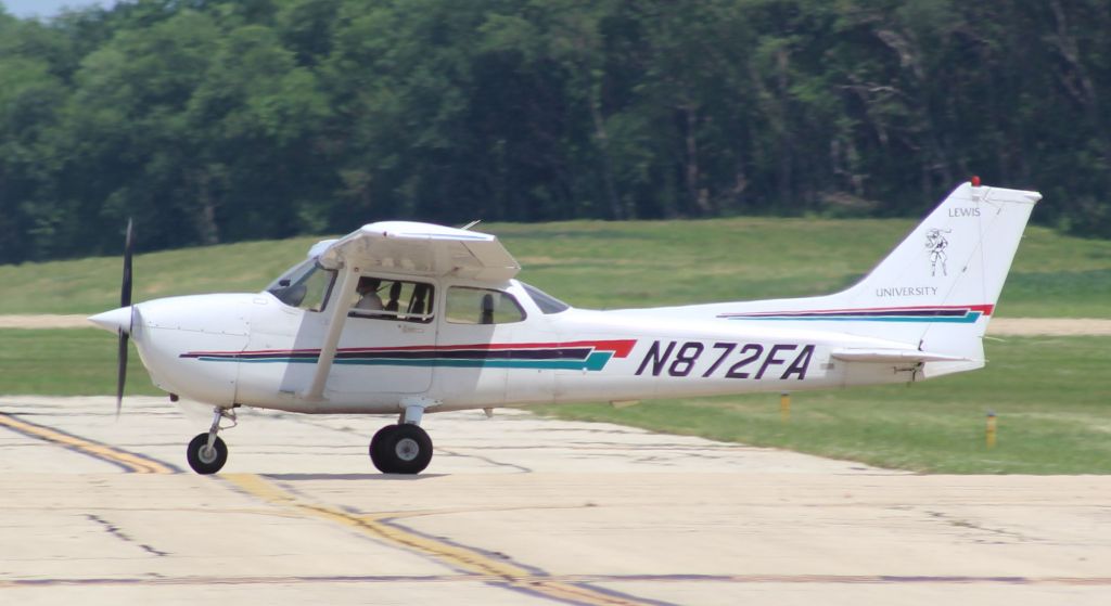 Cessna Skyhawk (N872FA) - Whiteside Co. Airport 10 June 2021br /I caught this Lewis 172 on mid touch and go off runway 18.br /Gary C. Orlando Photo
