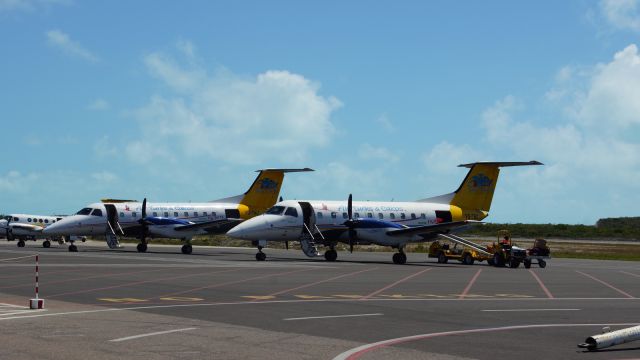 Embraer EMB-120 Brasilia (VQ-TBC) - 3 OF AIR TURKS AND CAICOS FLEET PARKED UP.