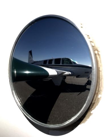 Beechcraft Bonanza (36) (N3052J) - Reflections
