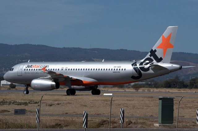 Airbus A320 (VH-VQV) - On taxi-way heading for Terminal 1 after using the entire length of runway 23 to pull up. Thursday, 4th April 2013.