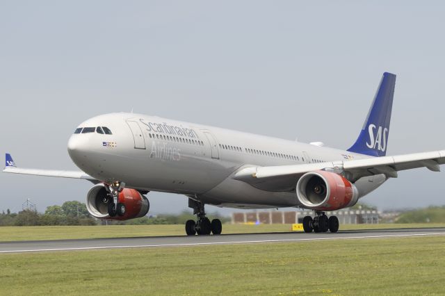 LN-RKT — - Standning Next to Runway 04R