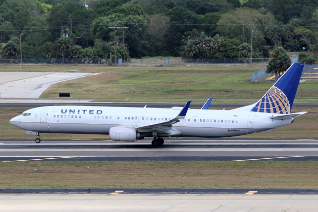 Boeing 737-900 (N69840) - United Airlines (UA) N69840 B737-924 ER [cn42181]br /Tampa (TPA). United Airlines flight UA1948 departing for Houston (IAH). br /Taken from TPA Long Term Parking Garagebr /2017 05 14  a rel=nofollow href=http://alphayankee.smugmug.com/Airlines-and-Airliners-Portfolio/Airlines/AmericasAirlines/United-Airlines-UAhttps://alphayankee.smugmug.com/Airlines-and-Airliners-Portfolio/Airlines/AmericasAirlines/United-Airlines-UA/a