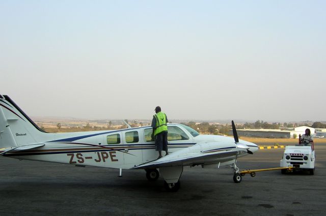 Beechcraft Baron (58) (ZS-JPE) - My friends, the line staff of King Air charters.