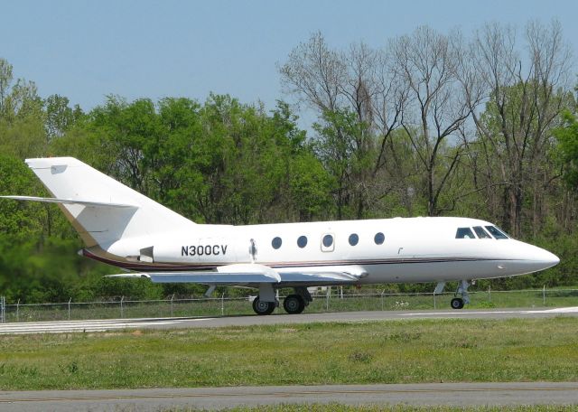 Dassault Falcon 20 (N300CV) - Starting to roll for take off on runway 14 at the Shreveport Downtown airport.