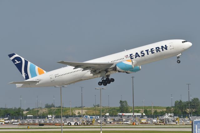 Boeing 777-200 (N825KW) - 23L 06-23-25