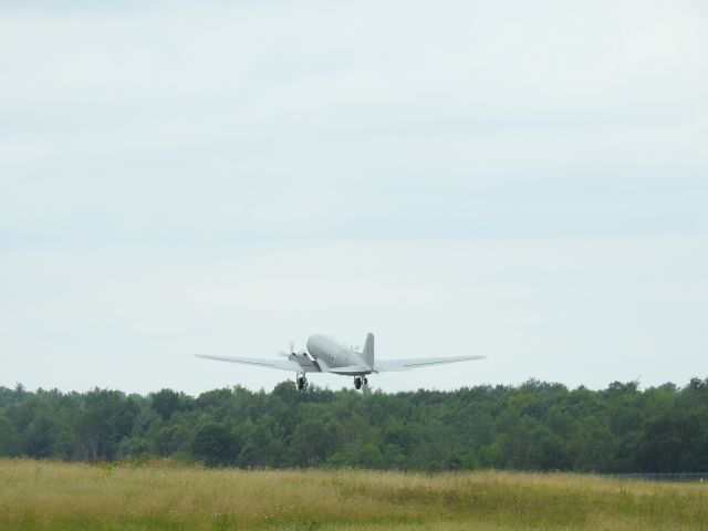 — — - DC-3 Lift off at CYQA Muskoka Canada