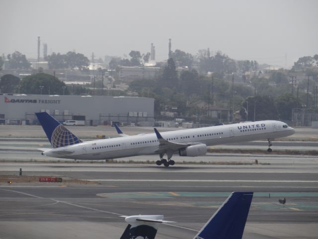 BOEING 757-300 (N37857) - LAX on a very cloudy day.