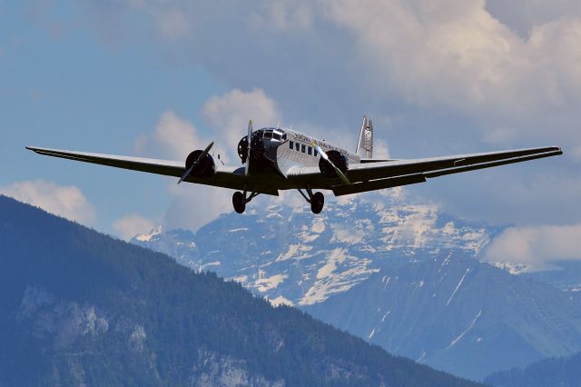 JUNKERS Ju-52/3m (HB-HOP) - HB-HOP, Junkers JU-52/3m g4ebr /Buildt 1939 in Dessau, Germany. Used from 1939 until 1981 as flying classroom for the swiss army "Fliegertruppe" as No. A-703br /Since 1982 member of Ju-Air, a company driven by volunteers. Here seen as guest in Thun in front of the swiss alps.