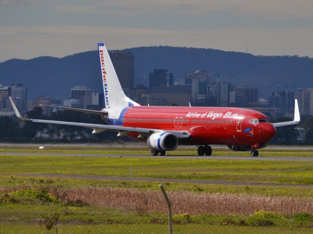 Boeing 737-800 (VH-VOX) - On taxi-way heading for take off on runway 05. Thursday 12th July 2012.