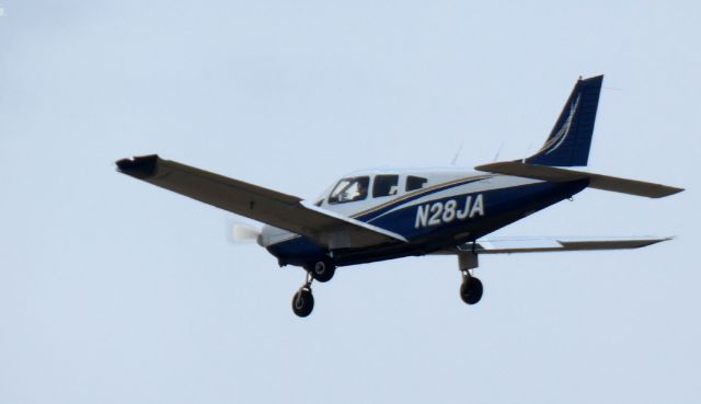 Piper Cherokee (N28JA) - About to touch down is this1982 Piper PA-28-181 Cherokee Archer II in the Winter of 2024.