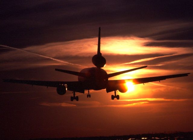 McDonnell Douglas DC-10 — - United DC -10 landing into a beautiful sunset in the late 70s