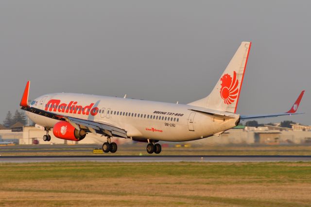 Boeing 737-800 (9M-LNU) - Early morning arrival on runway 23, Feb 10, 2020.