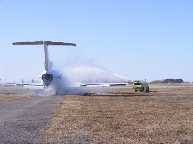 — — - Fire fighting vehicle #8 praticing on a 727 at Ottawa.