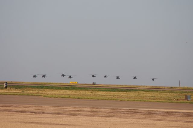 — — - 9 Blackhawks from Ft. Campbell approaching KLBB to land