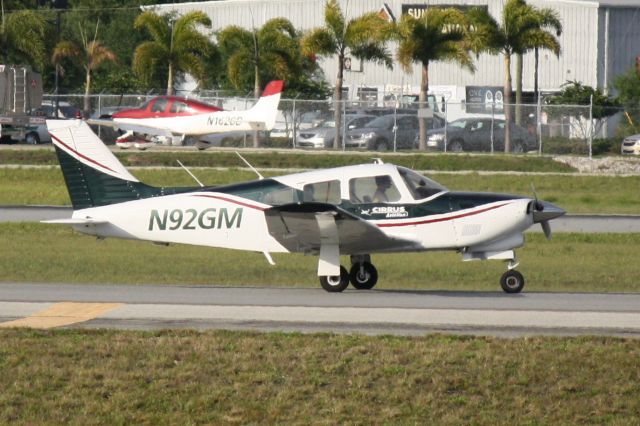 Piper Cherokee (N92GM) - N92GM taxis for departure at Sarasota-Bradenton International Airport