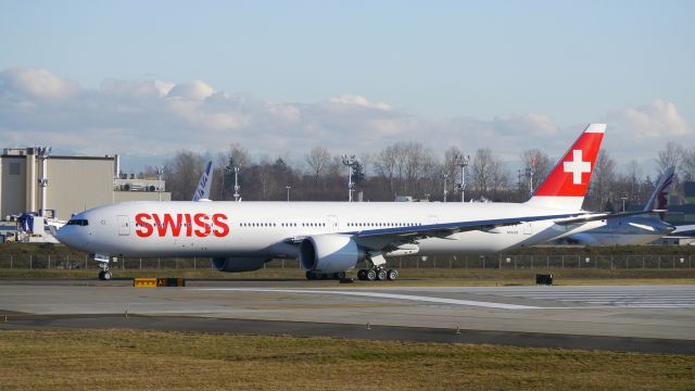 BOEING 777-300 (HB-JNA) - BOE576 using temp reg #N5022E taxis to Rwy 16R for an EWA flight on 1/8/16. (ln 1363 / cn 44582). This is the first B773 for Swiss Intl Airlines.