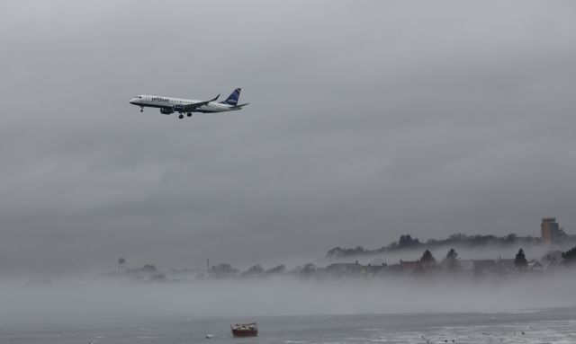 Embraer ERJ-190 (N375JB) - Landing over icy waters with fog just above the water!