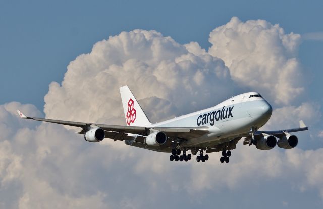 Boeing 747-400 (LX-ICL) - Thanks to some morning thunderstorms the evening was left with beautiful clouds for photography (please view in full for best photo quality)