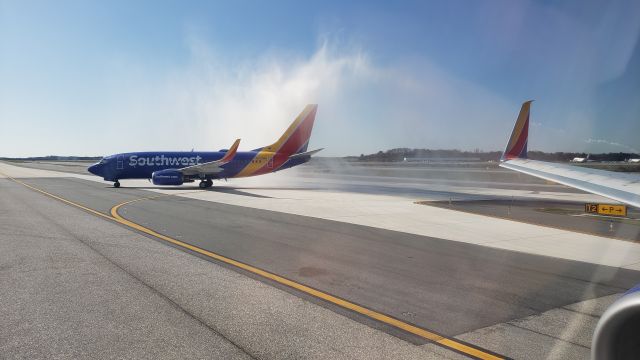 Boeing 737-700 (N932WN) - End of a water cannon salute.