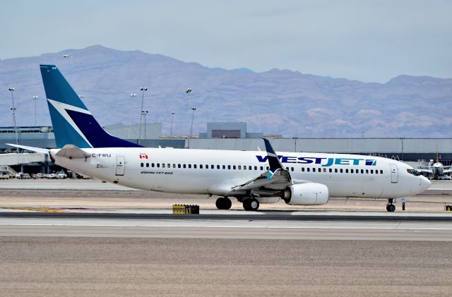 Boeing 737-800 (C-FWIJ) - C-FWIJ Westjet 2012 Boeing 737-8CT - cn 39072 / ln 4087 (Split Scimitar Winglets) - McCarran International Airport (KLAS)br /Las Vegas, Nevadabr /TDelCorobr /June 20, 2014