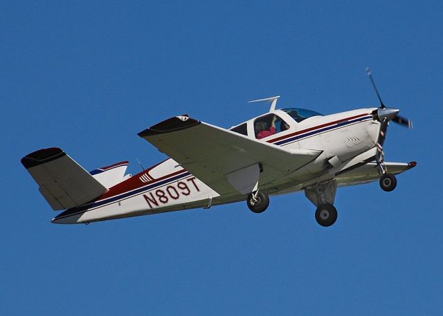 Beechcraft 35 Bonanza (N809T) - Departing runway 8 at KBTP on Labor Day, 2008