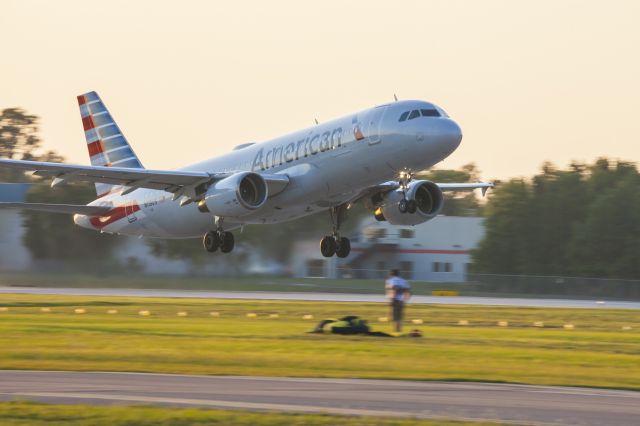 Airbus A320 (N118US) - Wednesday April 11th at Sun-N-Fun just before the night airshow kicked off. Photo Tower 2.