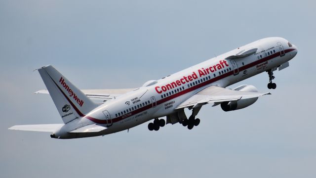 Boeing 757-200 (N757HW) - The Honeywell 757 testbed made a surprise visit to RDU today! Managed to catch her rotation off of 23L.  From the RDU parking deck, 8/15/19.