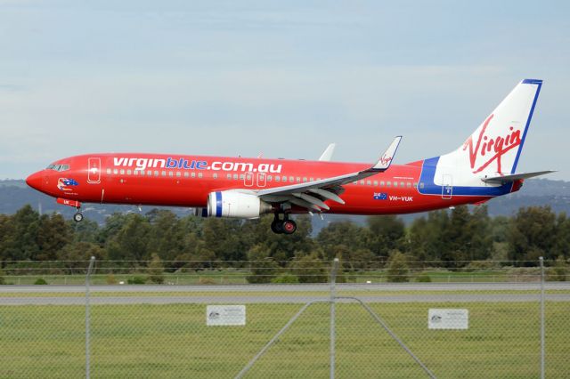 Boeing 737-800 (VH-VUK) - About to put down on runway 05. Thursday, 19 June 2014.