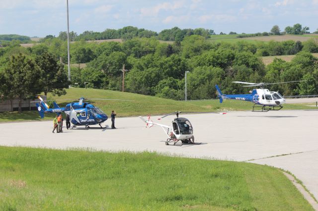 SCHWEIZER 269 (N2051J) - 053114 SASM Chopper day.Norfolk based LifeNet inbound. Schweizer 269C-1 and StarCare Messerschmitt BK117 on the ground.