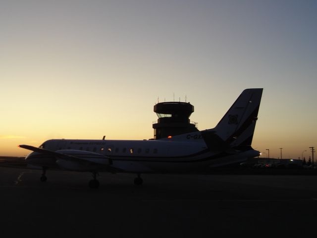 Saab 340 (C-GXPS) - Dusk falls at the Fort McMurray, Alberta Airport