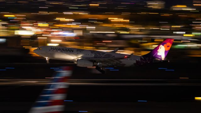 Airbus A330-200 — - Hawaiian Airlines A330-200 landing at PHX on 8/17/22. Taken with a Canon 850D and Rokinon 135mm f/2 manual focus lens.