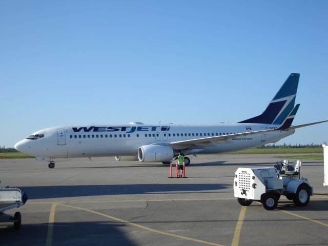 Boeing 737-800 (C-GZWS) - Taxiing from the gate to departure at Fort McMurray, Alberta, Canada on August 6th, 2008