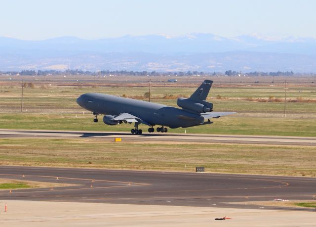 McDonnell Douglas DC-10 (87-0119) - KSMF - Travis AFB KC-10 Extender (7-0119) doing a touch and go on Runway 34 while I had "just put the 400mm away". I was on the top floor of the parking garage awaiting my noon departure for PHX, put the small lens back on the camera and failed to maintain "aircraft spotter" vigilance. I totally did not see this approaching and used the 135mm but still was able to motor-drive it for about 15 shots. Dec 4th, 2017.