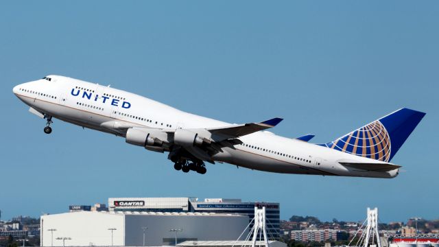 Boeing 747-400 (N107UA) - Departing 34L